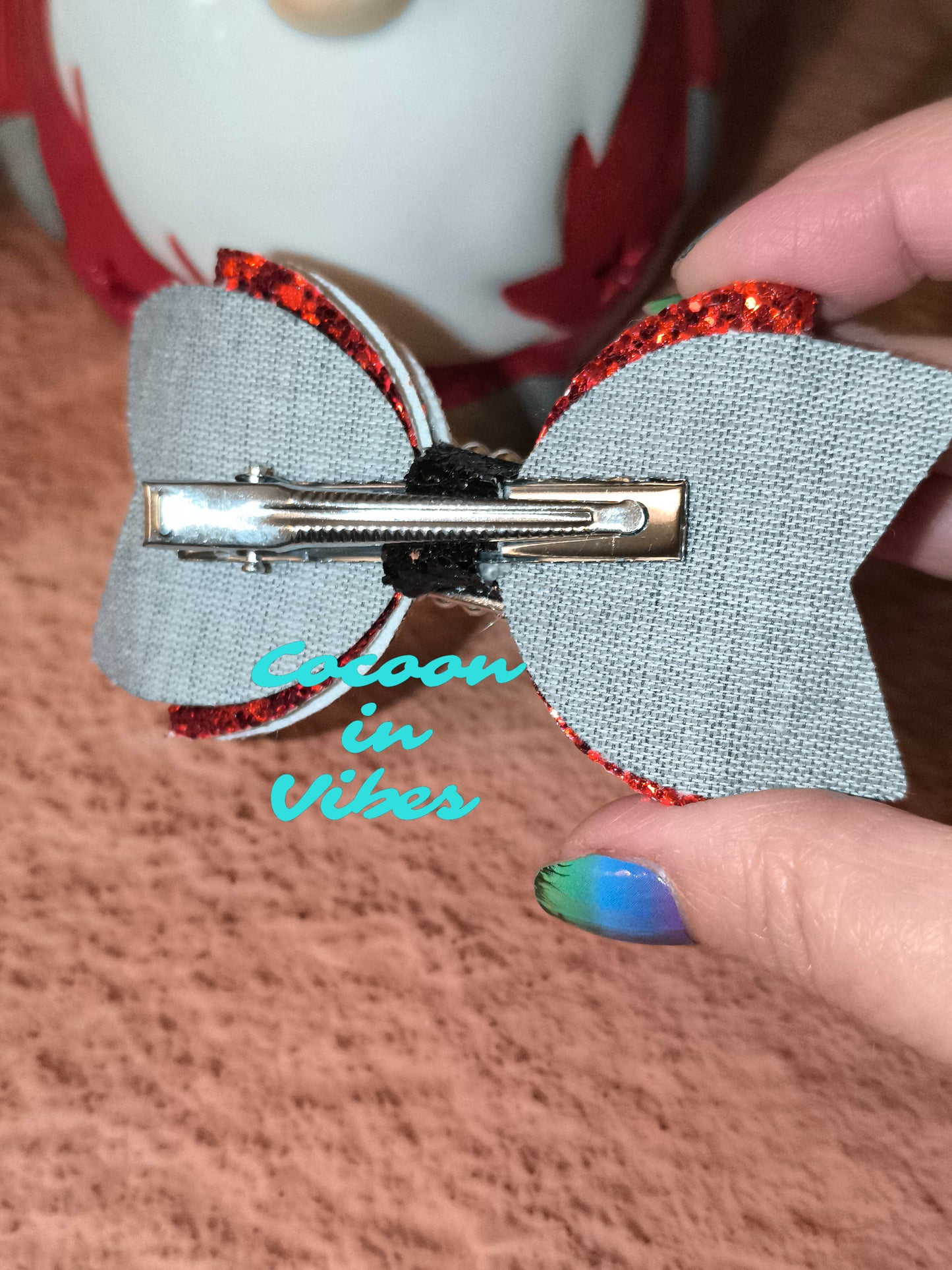 La Pince “Ceinture du Père Noël” – L’accessoire magique du Réveillon !