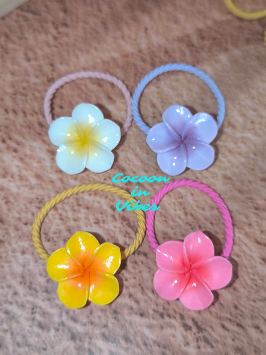 Élastiques Fleur de Monoï – La petite touche colorée toute l’année !