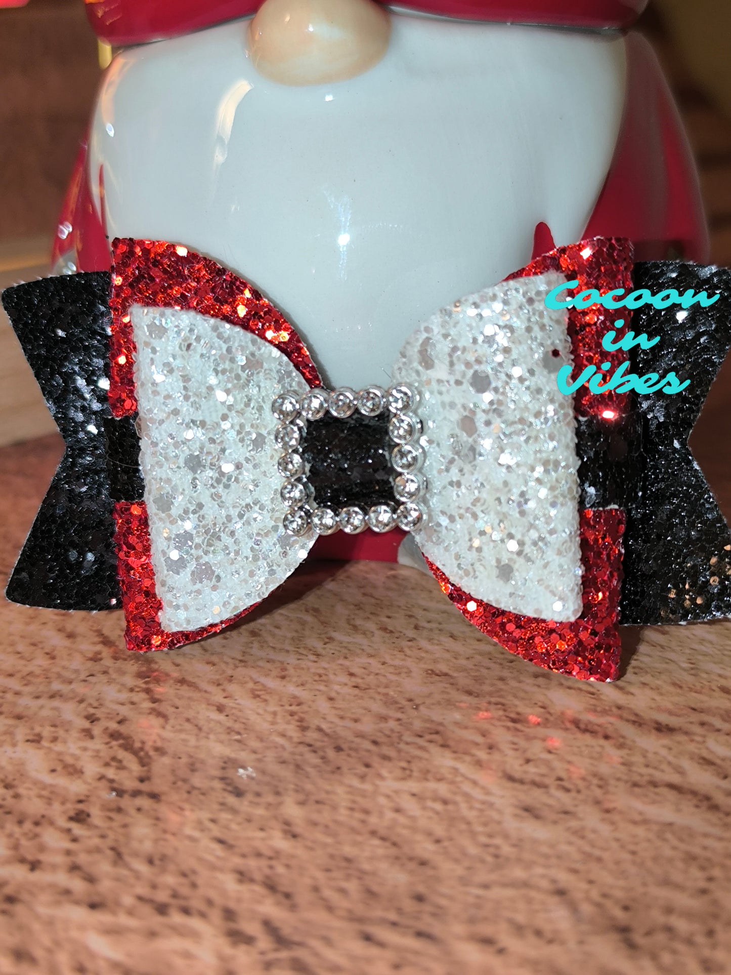 La Pince “Ceinture du Père Noël” – L’accessoire magique du Réveillon !