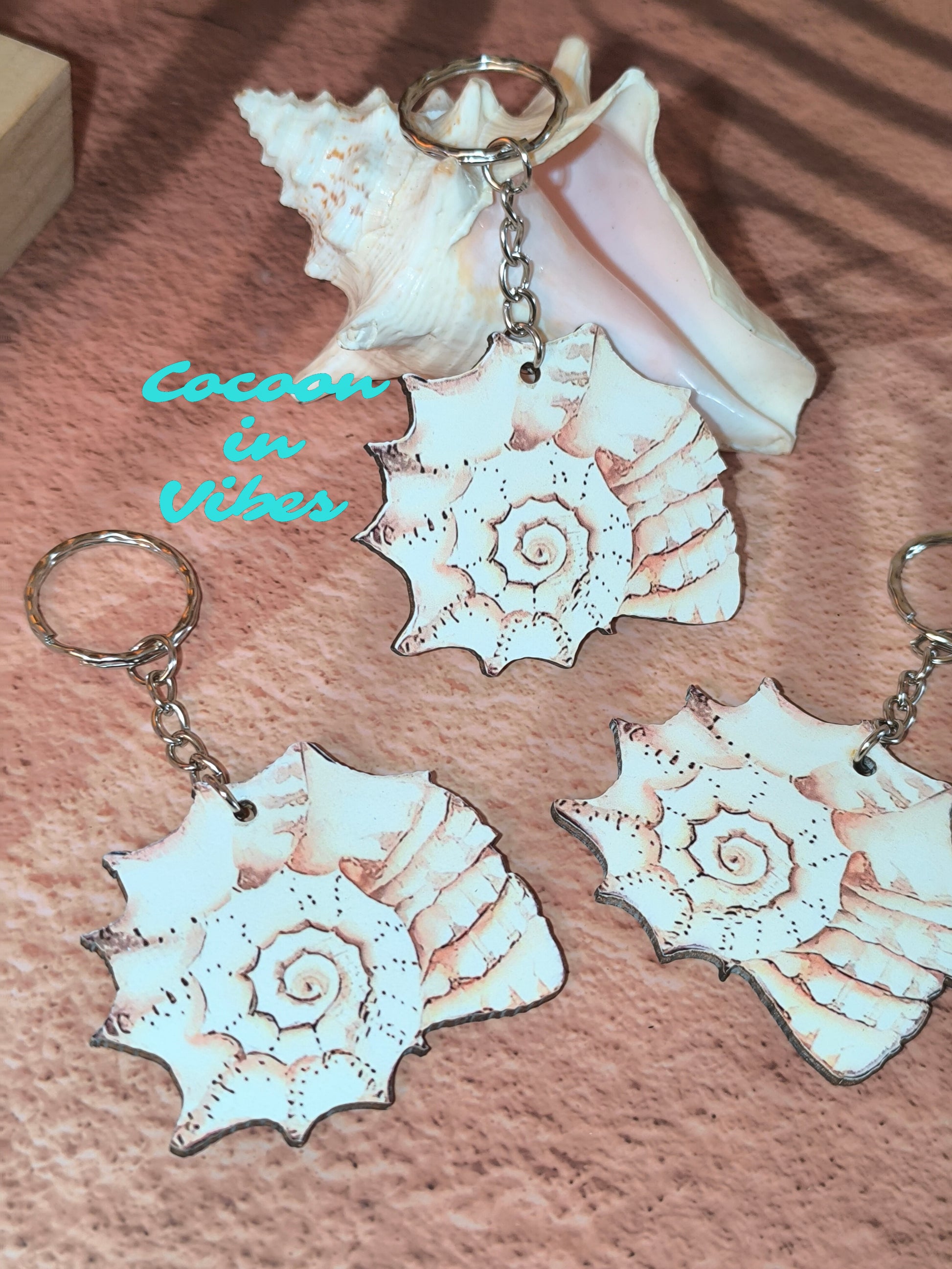 Porte-clé artisanal création Cocoon in Vibes – Coquillage en Spirale