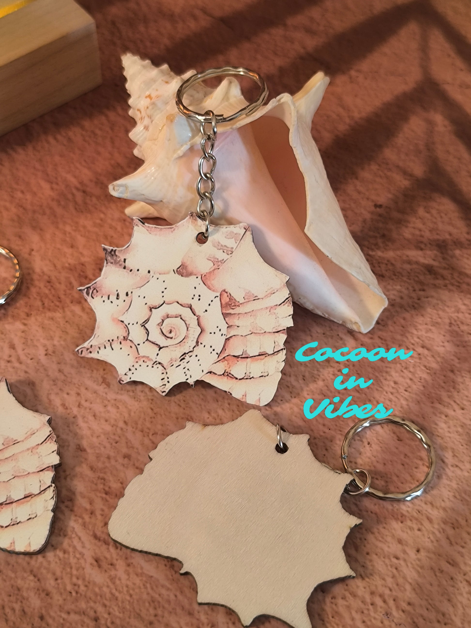 Porte-clé artisanal création Cocoon in Vibes – Coquillage en Spirale