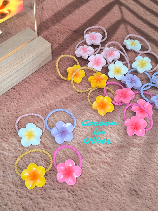 Élastiques Fleur de Monoï – La petite touche colorée toute l’année !