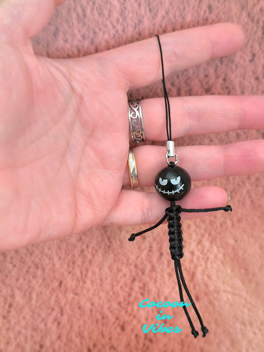 Bijou de téléphone (squelette monstre noir) - Le compagnon effrayant de votre smartphone !