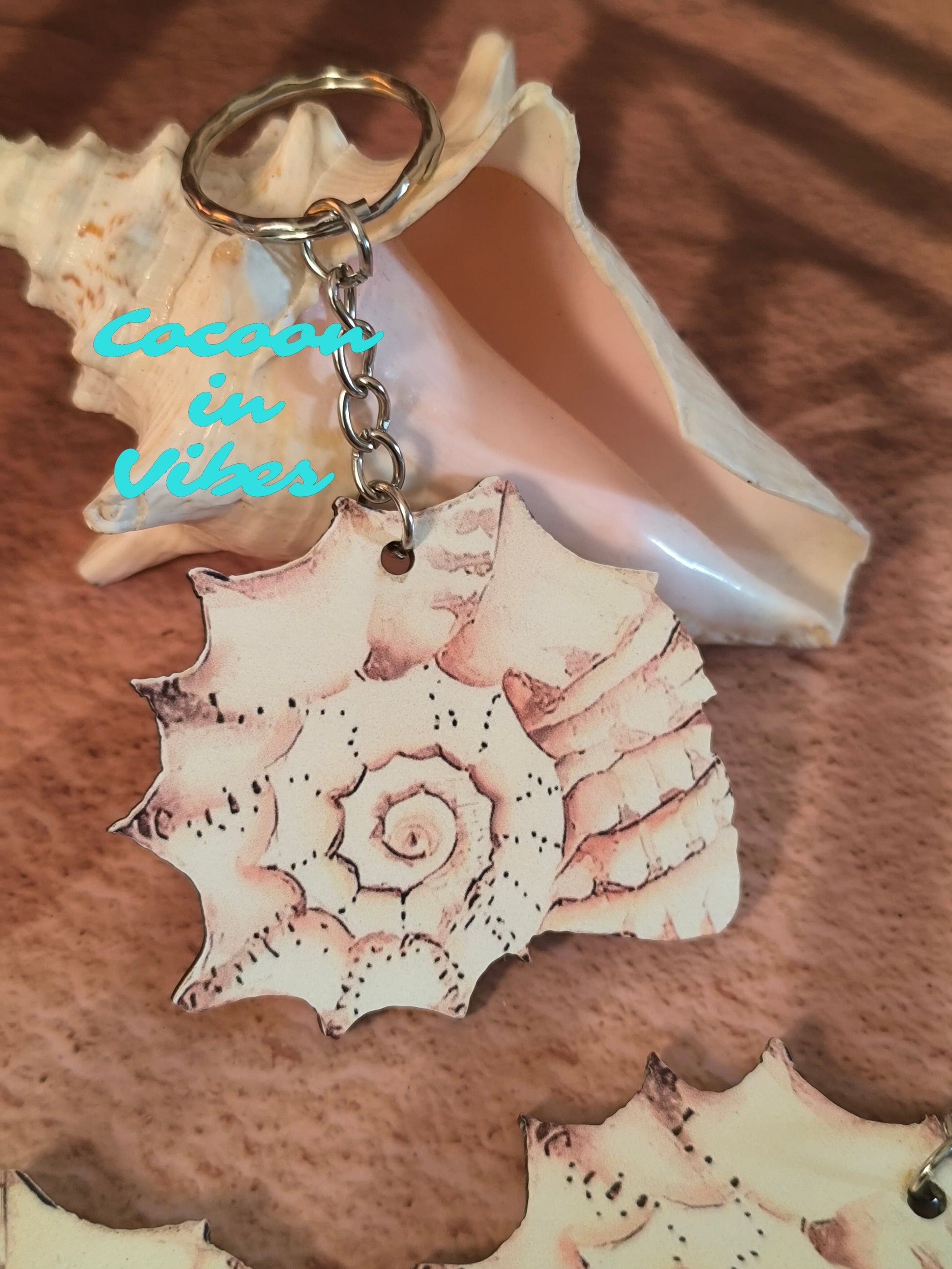 Porte-clé artisanal création Cocoon in Vibes – Coquillage en Spirale
