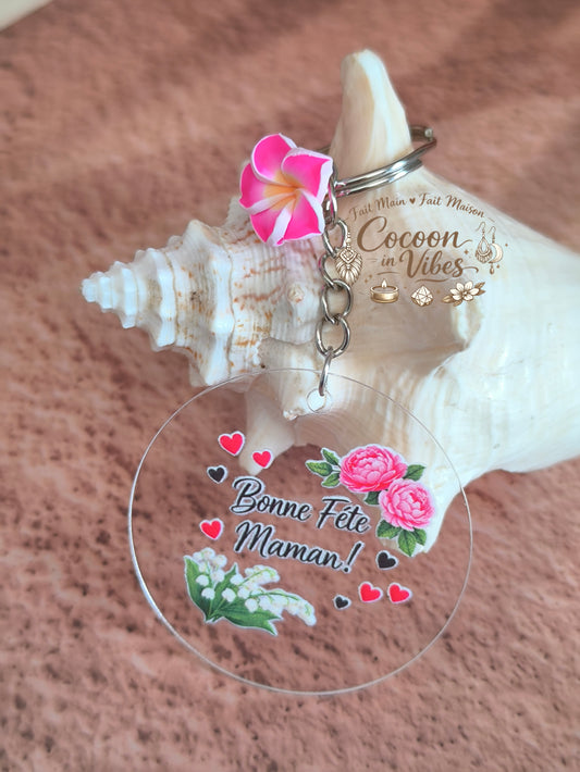 Porte-clé rond transparent “Fête des Mères – Doux Messages – Bonne fête maman” – Motifs Pivoines & Muguet – Fleur décorative – Création fait main et modèle unique